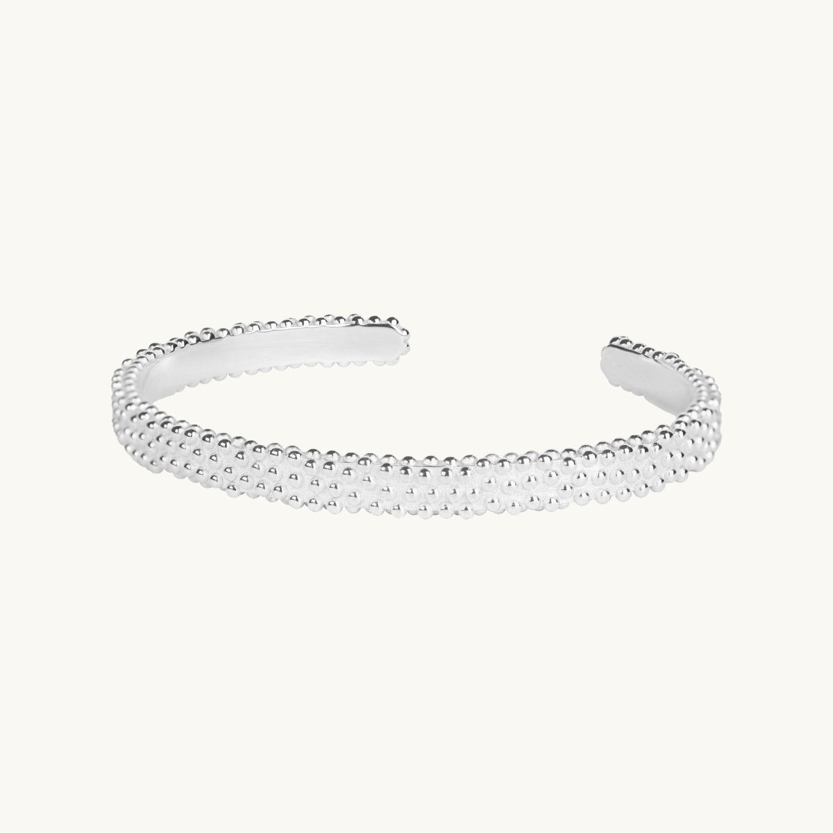 Hard bracelet in sterling silver with a uneven surface