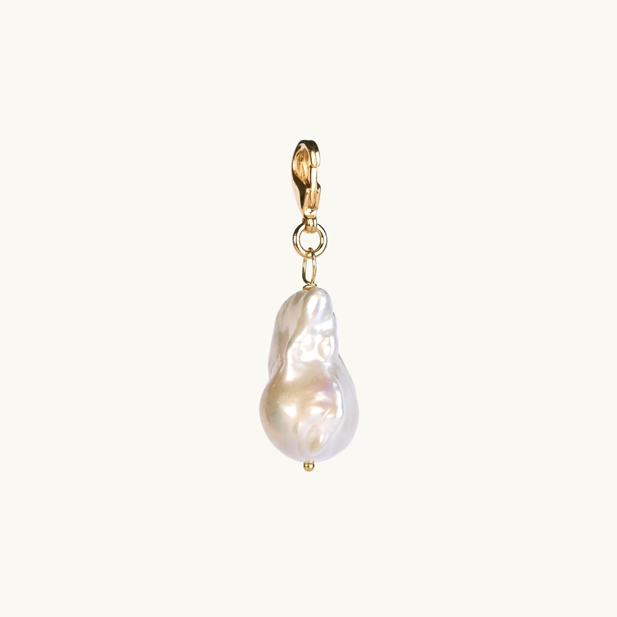 A freshwater pearl on a gold clasp