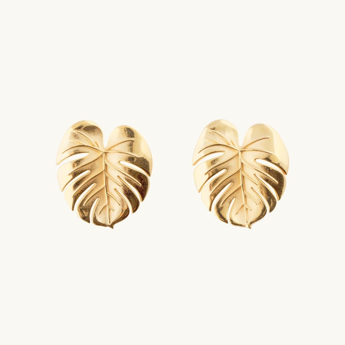 Earrings in shape of palm leafs in gold