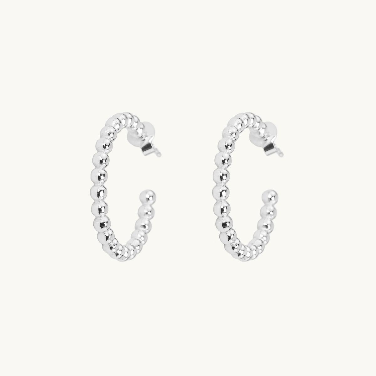 Hoops in silver with globes