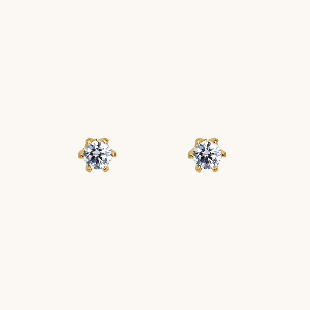Pin earrings with a 4mm white stone