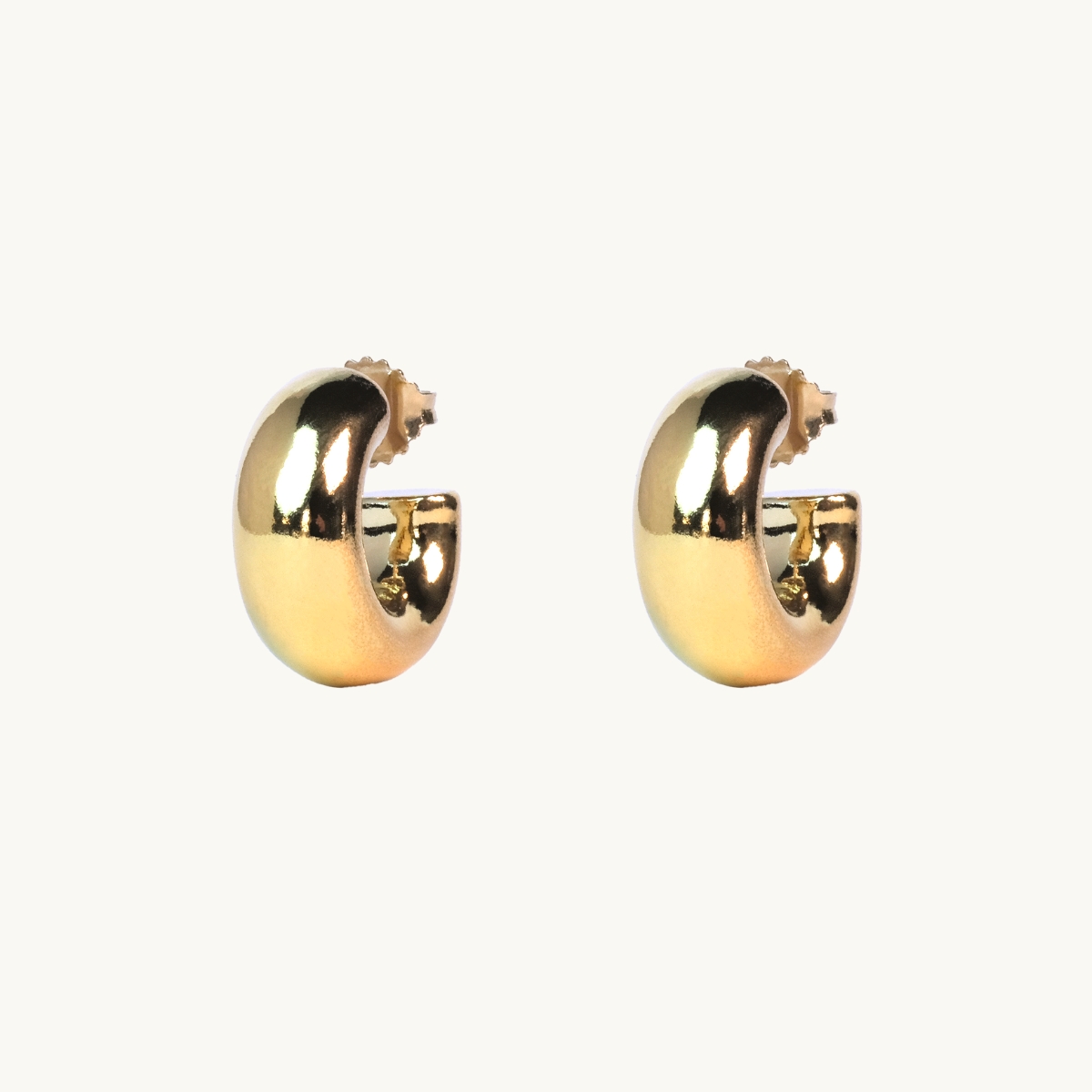 Small, wide hoops in gold