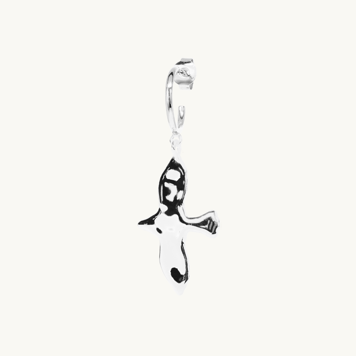 Hanging dove with an uneven surface in sterling silver