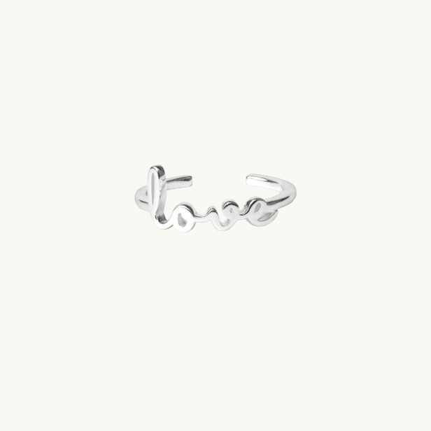 Silver ring with the word love
