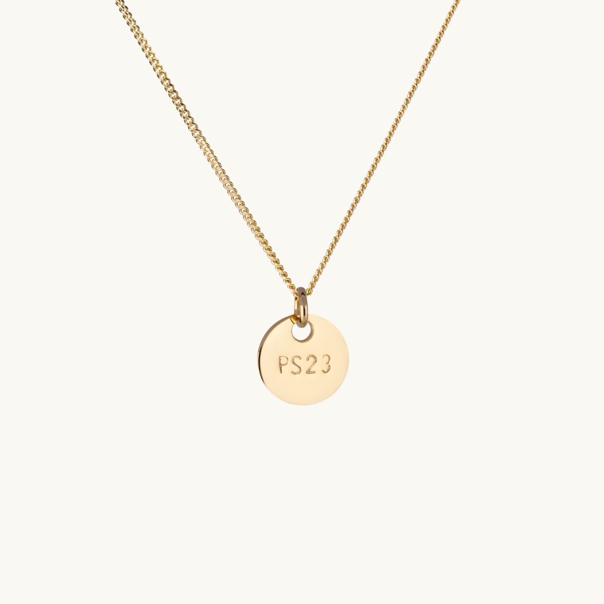Necklace in gold with a coin ps23