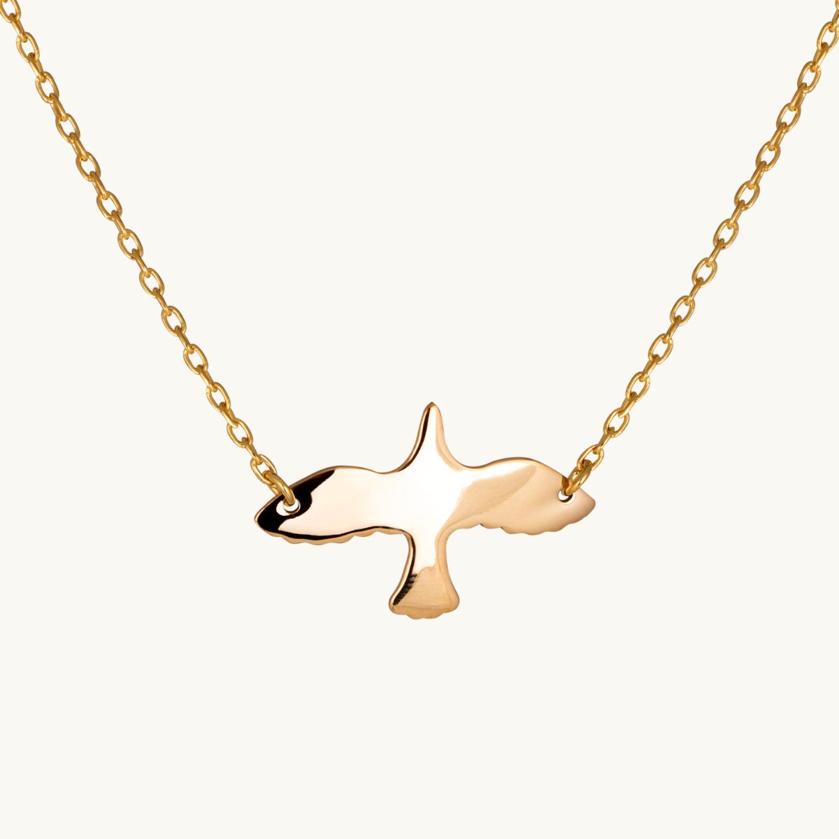 Golden necklace dove with wings