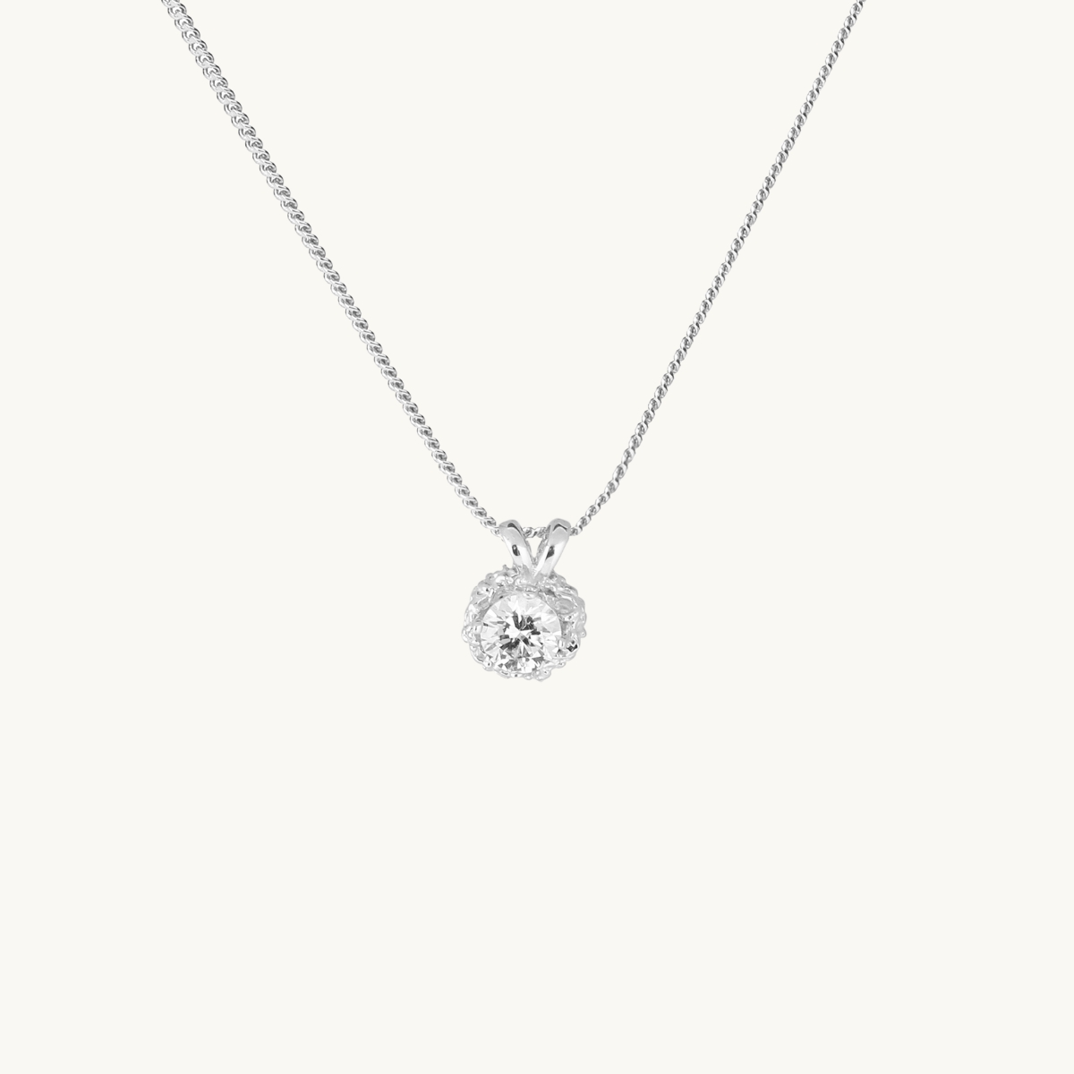 Necklace in silver with a white diamond