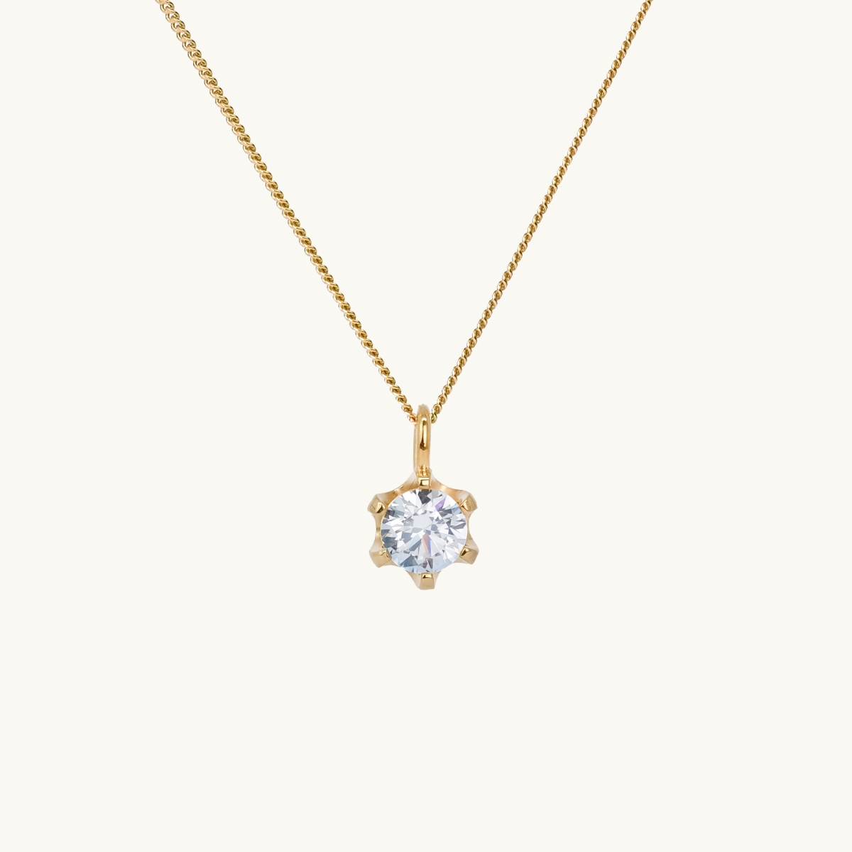 Necklace pendant gold with a white diamond, princess