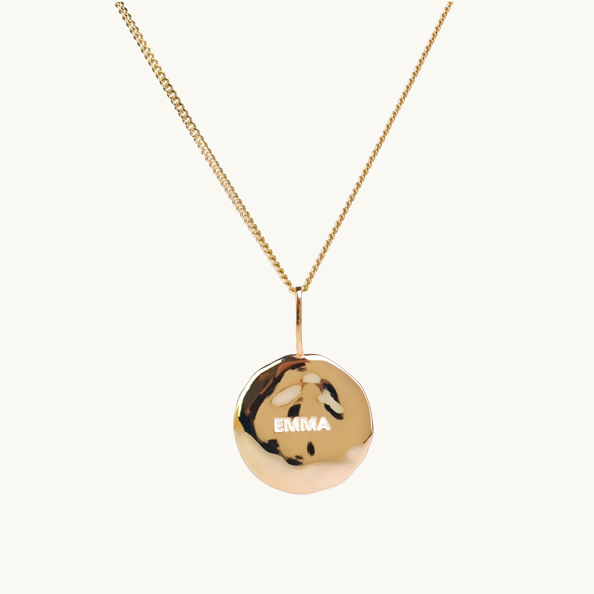 A name coin in sterling silver
