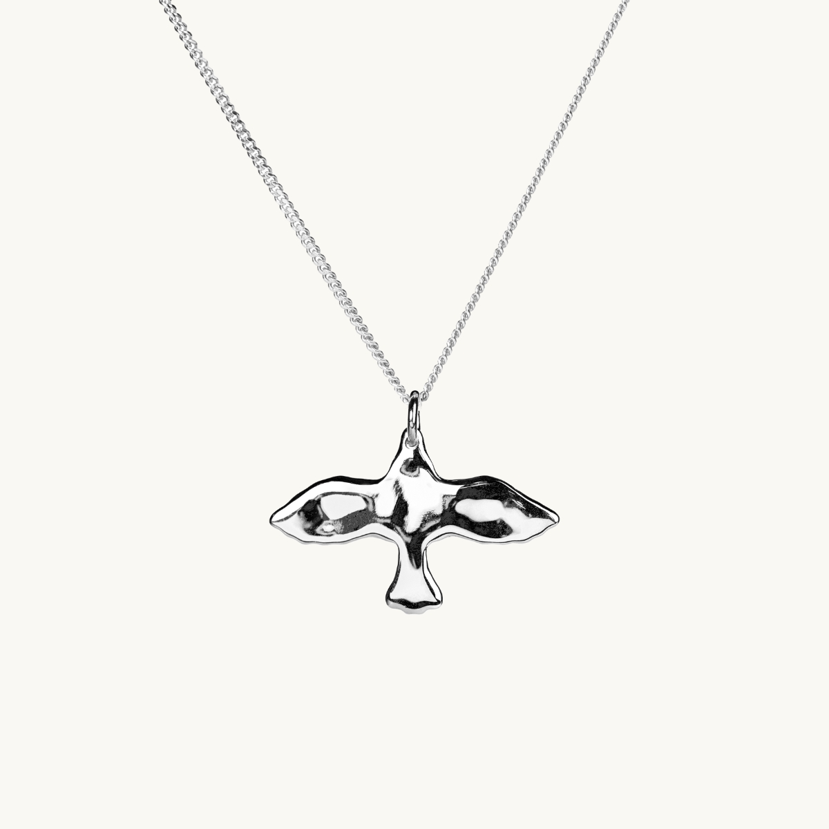 An uneven dove in sterling silver 