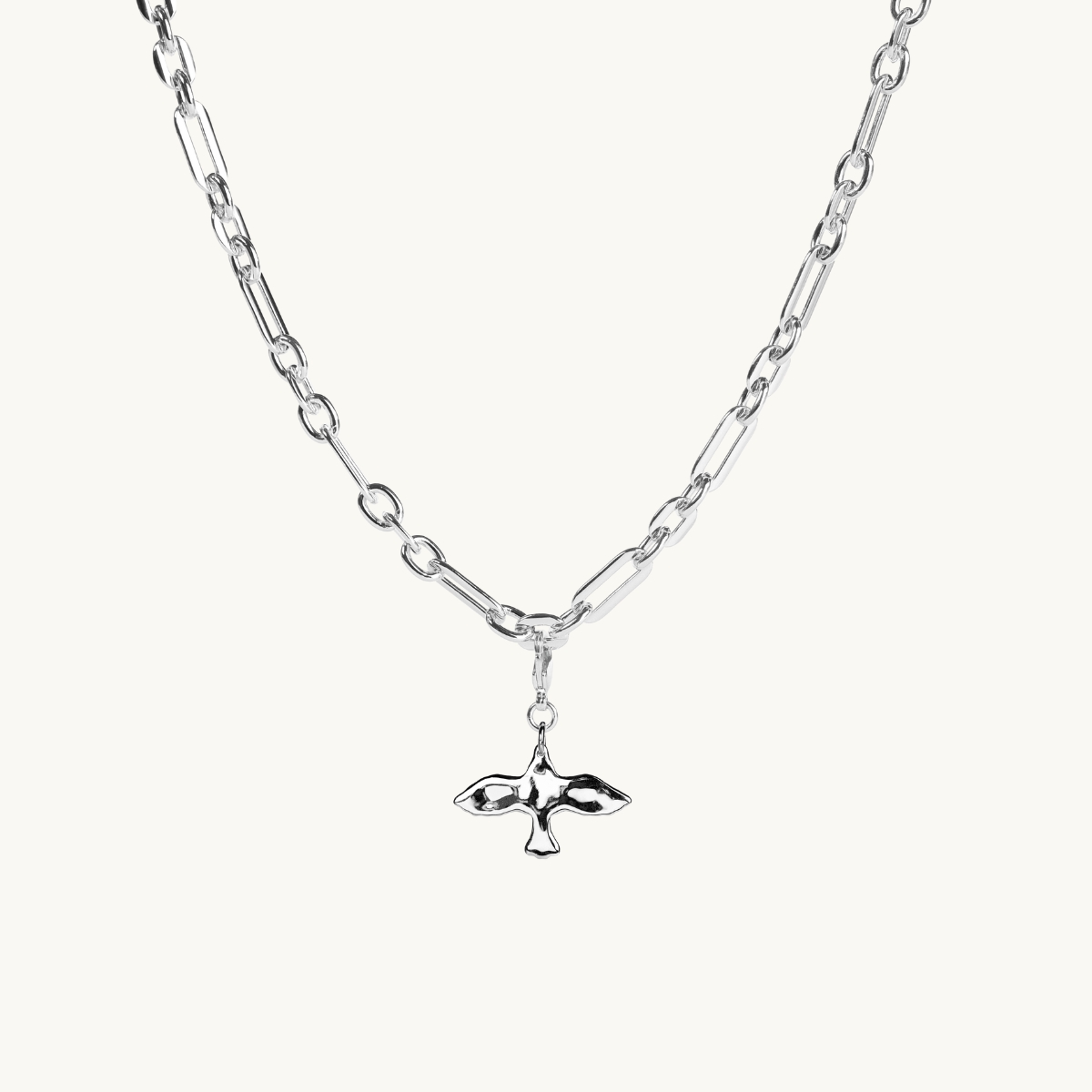 a dove charm on a chunky chain in sterling silver