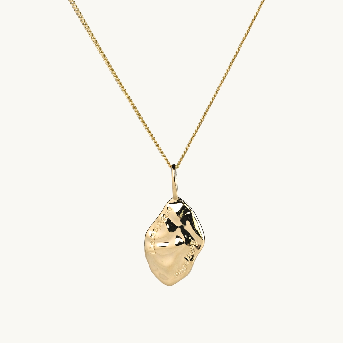 a pendant with a text about hope