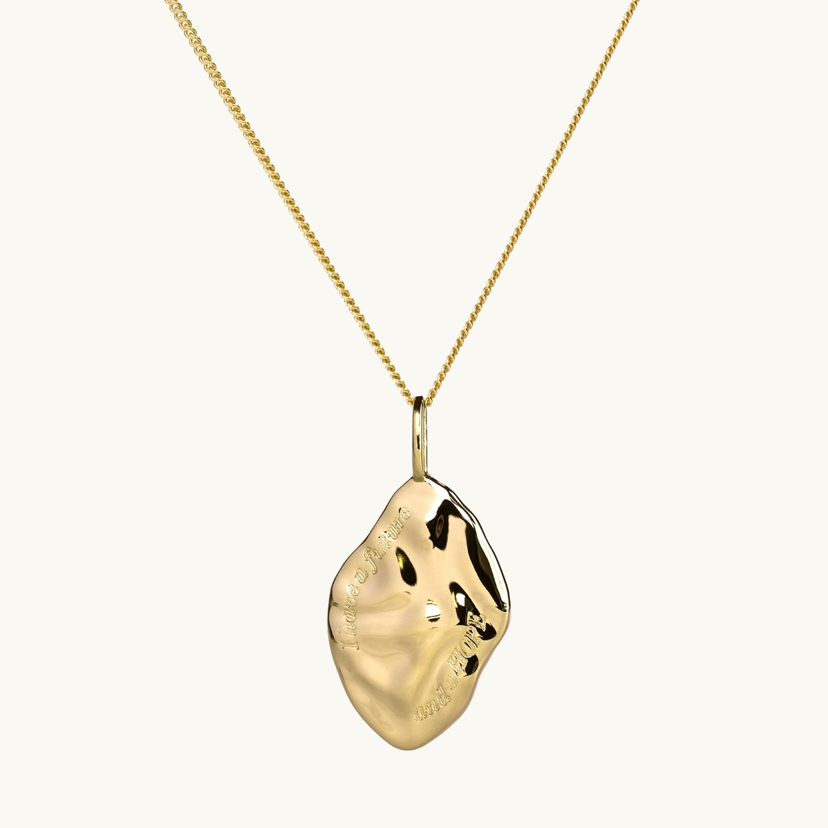 irregular shape on a pendant in gold