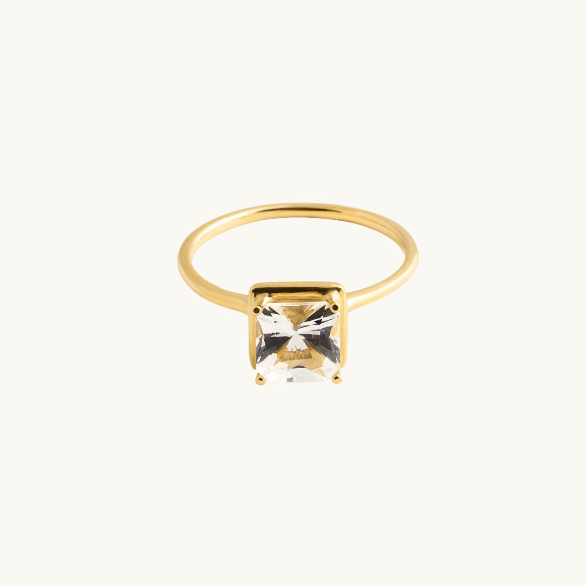 18K gold ring with a square white topaz stone