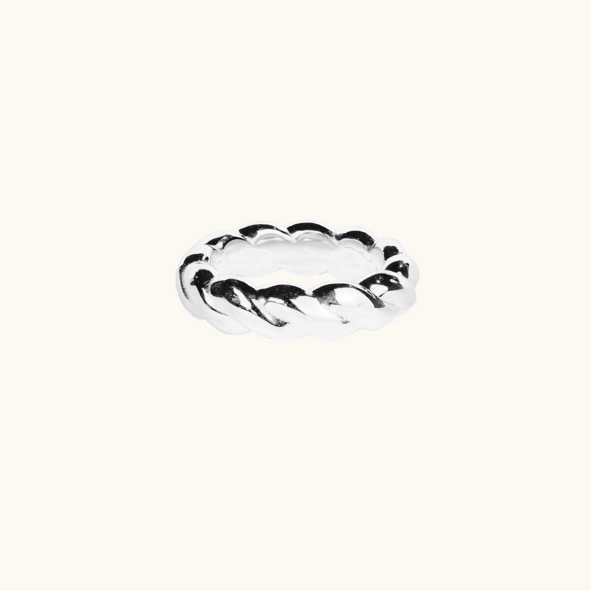 a band ring in a twisted pattern in sterling silver