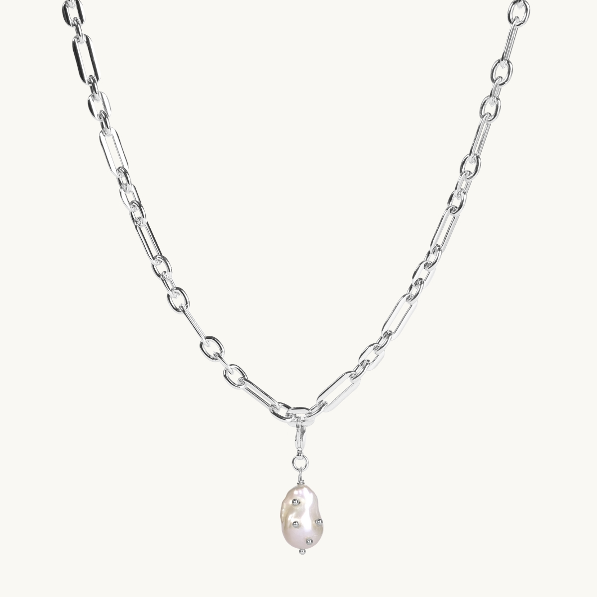 Freshwater pearl with silver studs