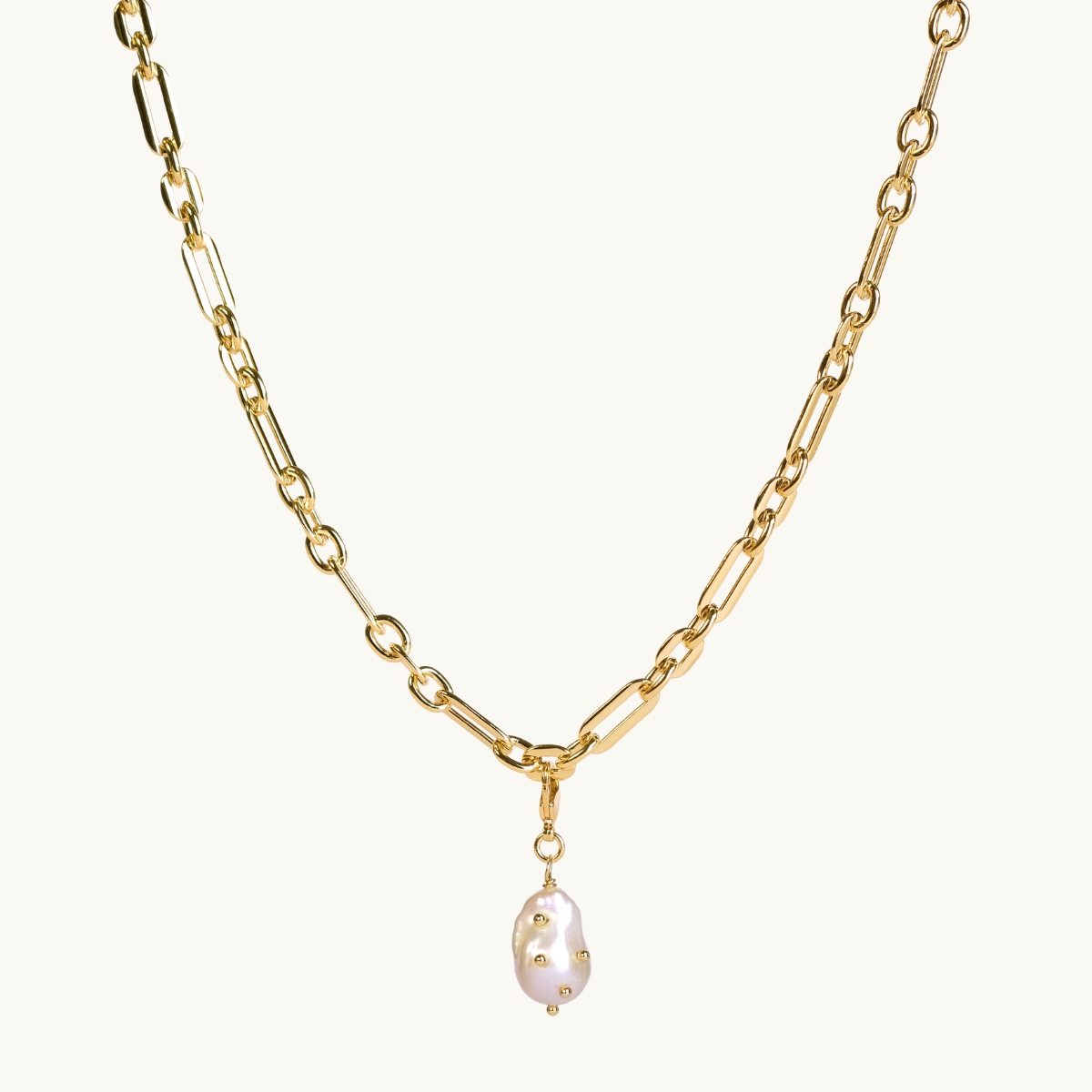 Freshwater pearl with golden studs