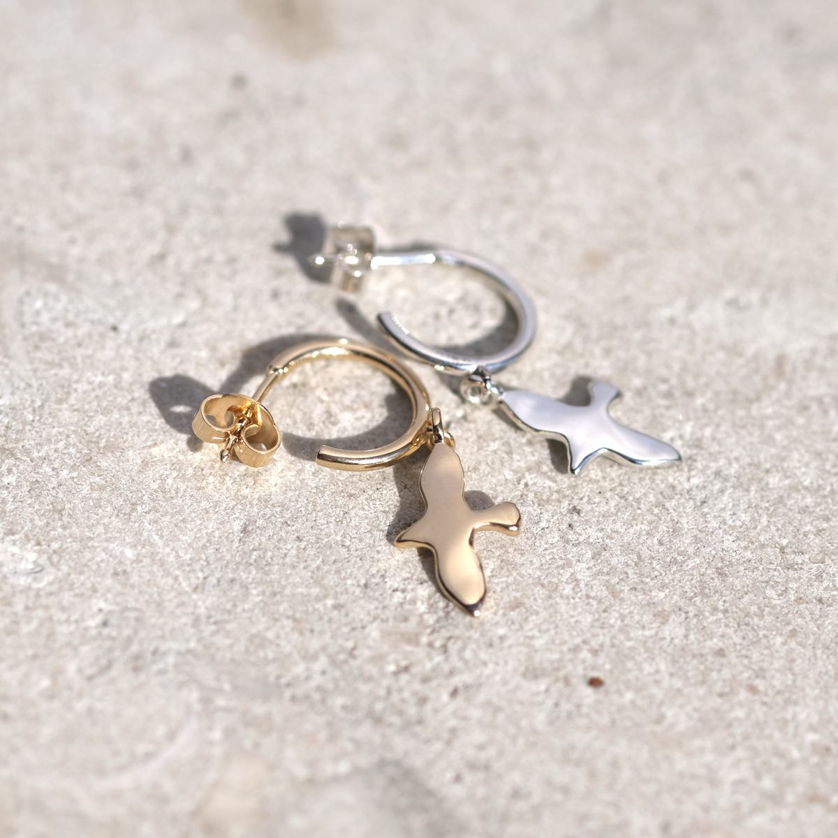 Earring with dove in silver