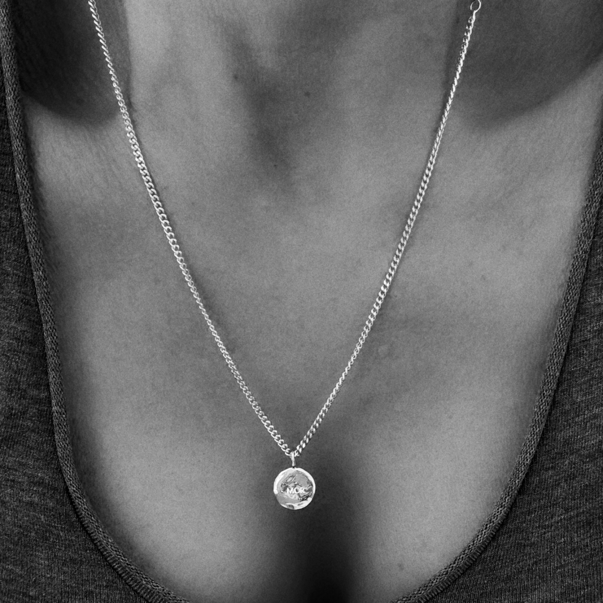 Organic coin in silver with the engraving MOR