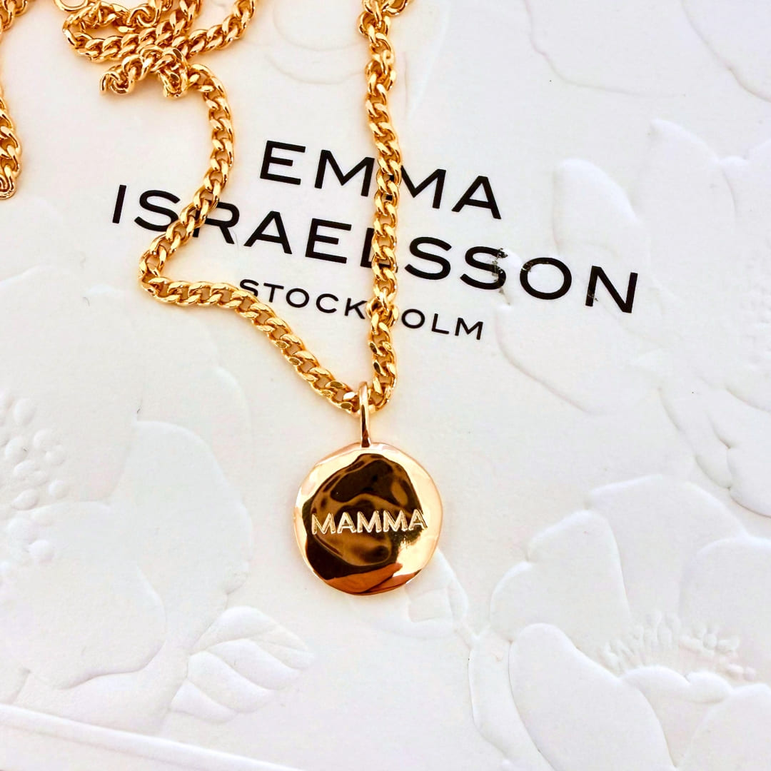 Organic coin in silver with the engraving MAMMA