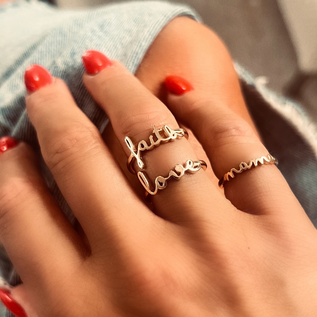 Silver ring with the word love