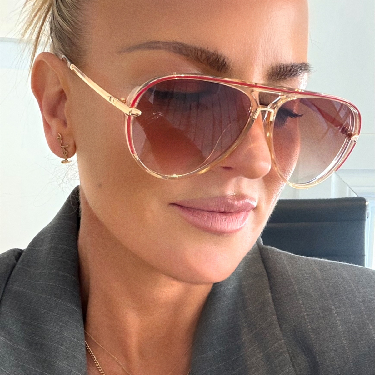 Champagne-colored aviator sunglasses