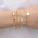 Globe bracelet and bangle bracelet in gold