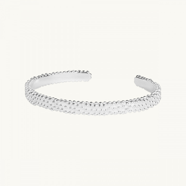 Hard bracelet in sterling silver with a uneven surface