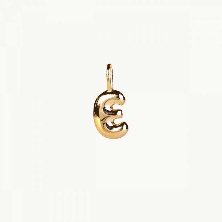 a letter coin in 18K gold plated brass