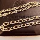Anchor and chunky link chain in gold