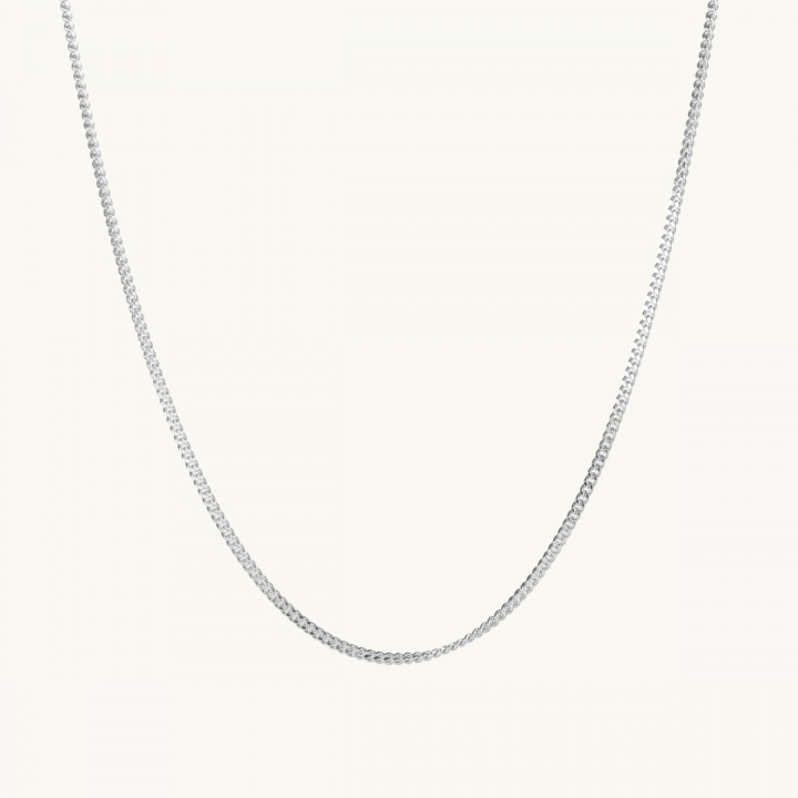 a silver chain with multiple lengths