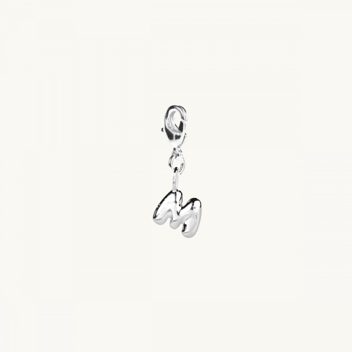 A silver letter on a clasp