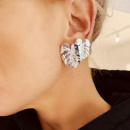 Two palm earrings in silver on model