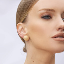 Deew Globe earrings on model