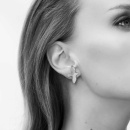 Dove earrings in silver on model
