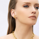 Dove earrings in gold on model
