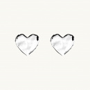 Heart shape earrings with an organic shape in silver