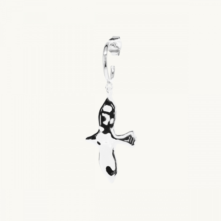 Hanging dove with an uneven surface in sterling silver