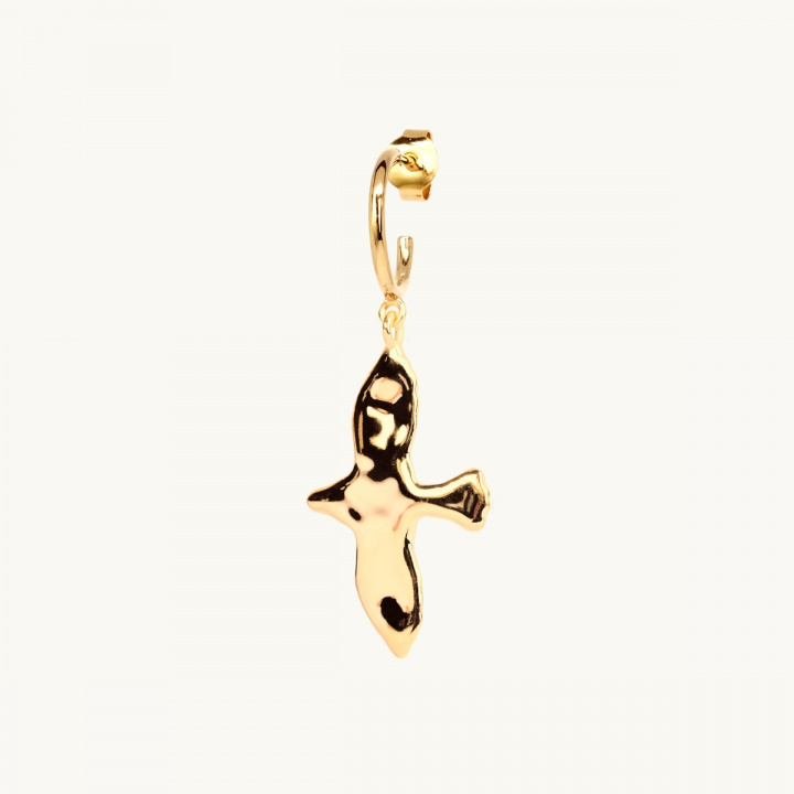 Hanging dove with an uneven surface in 18k goldplated brass