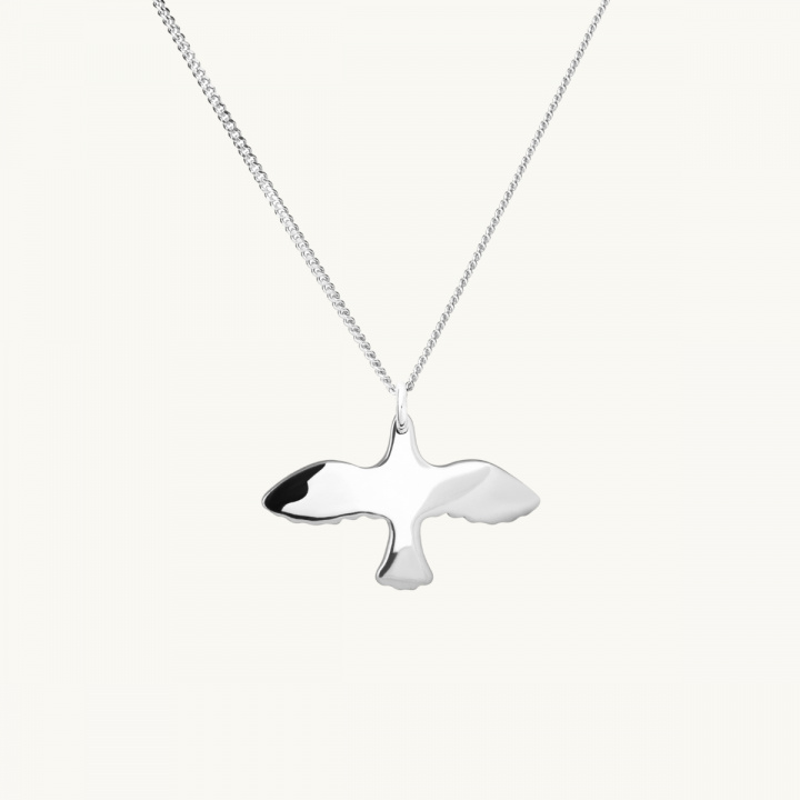 Silver bird on chain