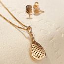 Padel necklace and earrings in gold