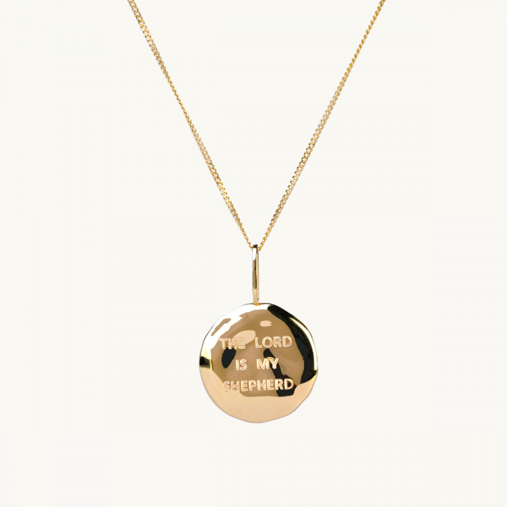 Gold coin with the inscription the lord is my shepherd