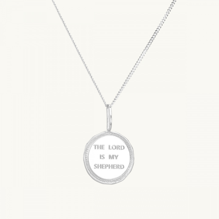 Silver coin with the inscription the lord is my shepherd
