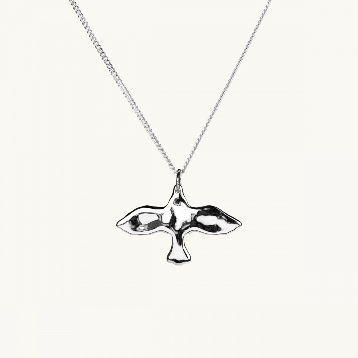 An uneven dove in sterling silver 