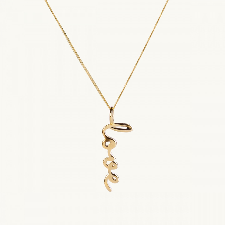 A love necklace in 18K gold plated brass.