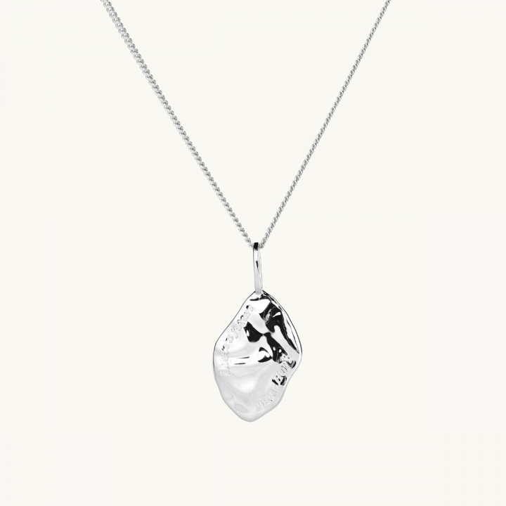 irregular shape on a pendant in sterling silver