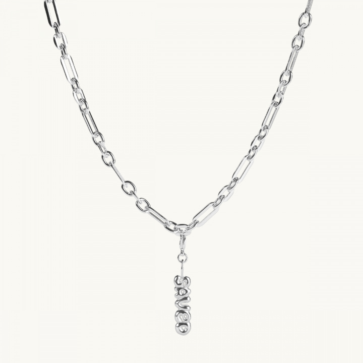 Silver necklace with the word saved 