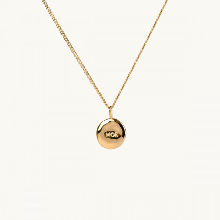 Organic coin in gold with the engraving MOR