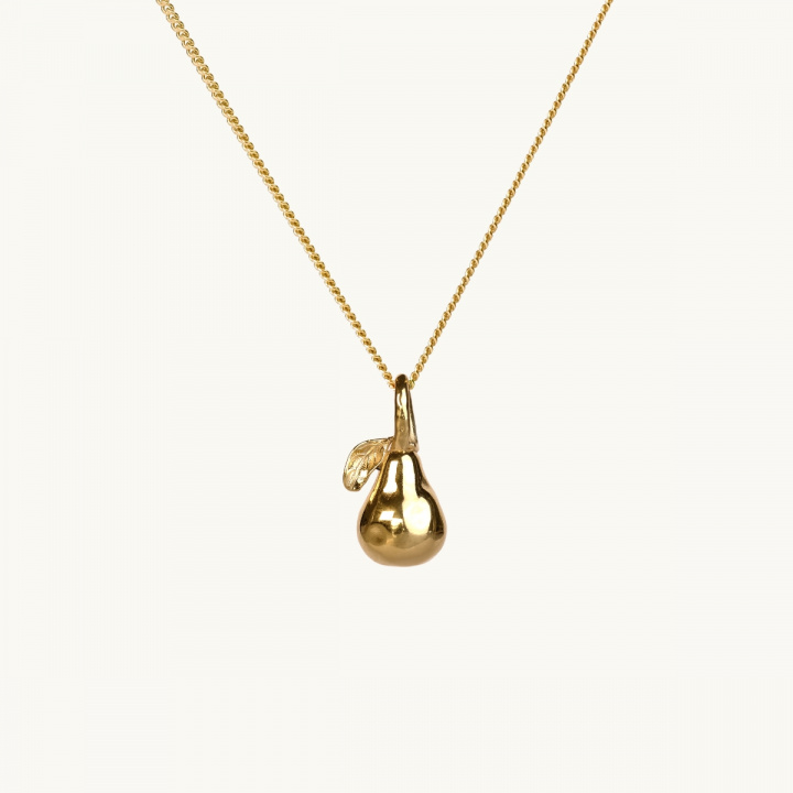 A gold necklace with a pendant in shape of a pear