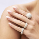 Dew and globe ring on model